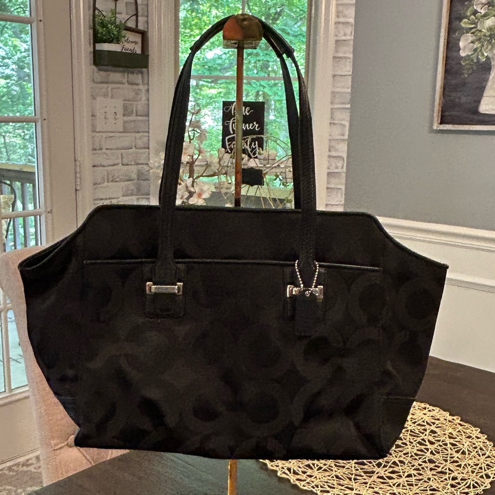 Coach OpArt Signature black canvas tote bag.
